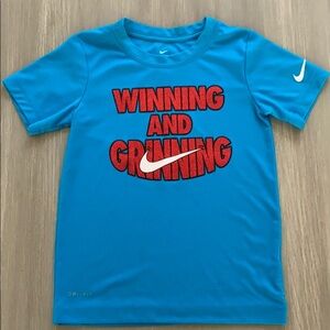 Nike “Winning and Grinning” Dri-FIT T-shirt